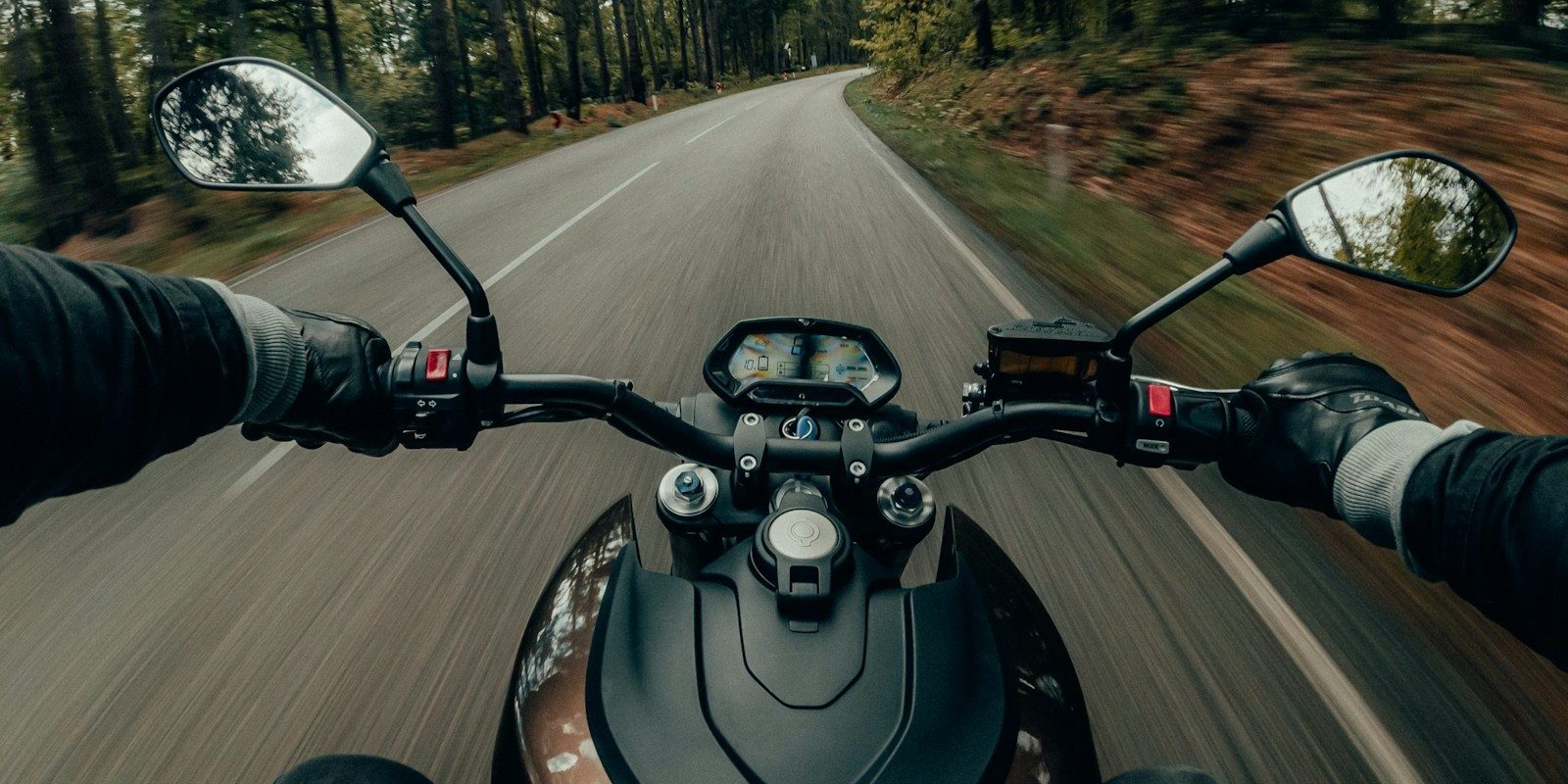 black and gray motorcycle on road during daytime