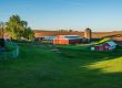 barn on green field